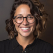 woman wearing glasses is smiling wearing 1